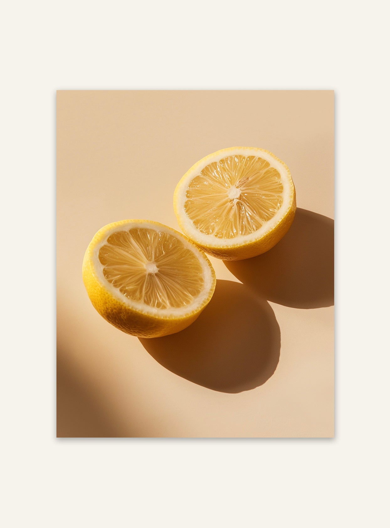 Citronhalvor poster av fruktmotiv från Nordanio, visar färska citronhalvor på vit bakgrund.