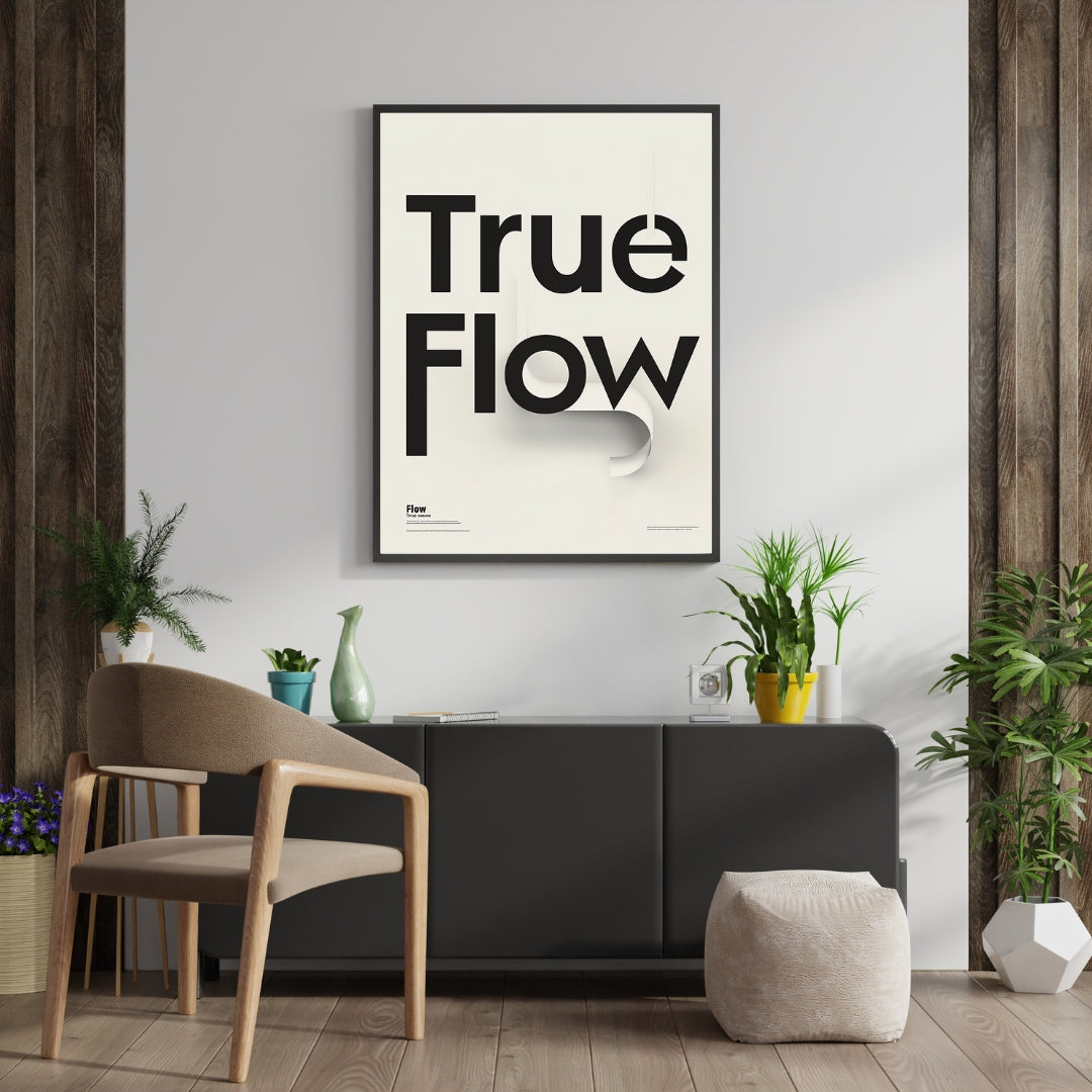 Grått modern typografiposter av Nordanio på vägg, visar stilren design i inredningsbilden.