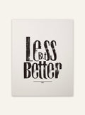 Typografiskt affisch med texten "Less Better" av Nordanio, modern design, svart text på vit bakgrund, väggdekoration.