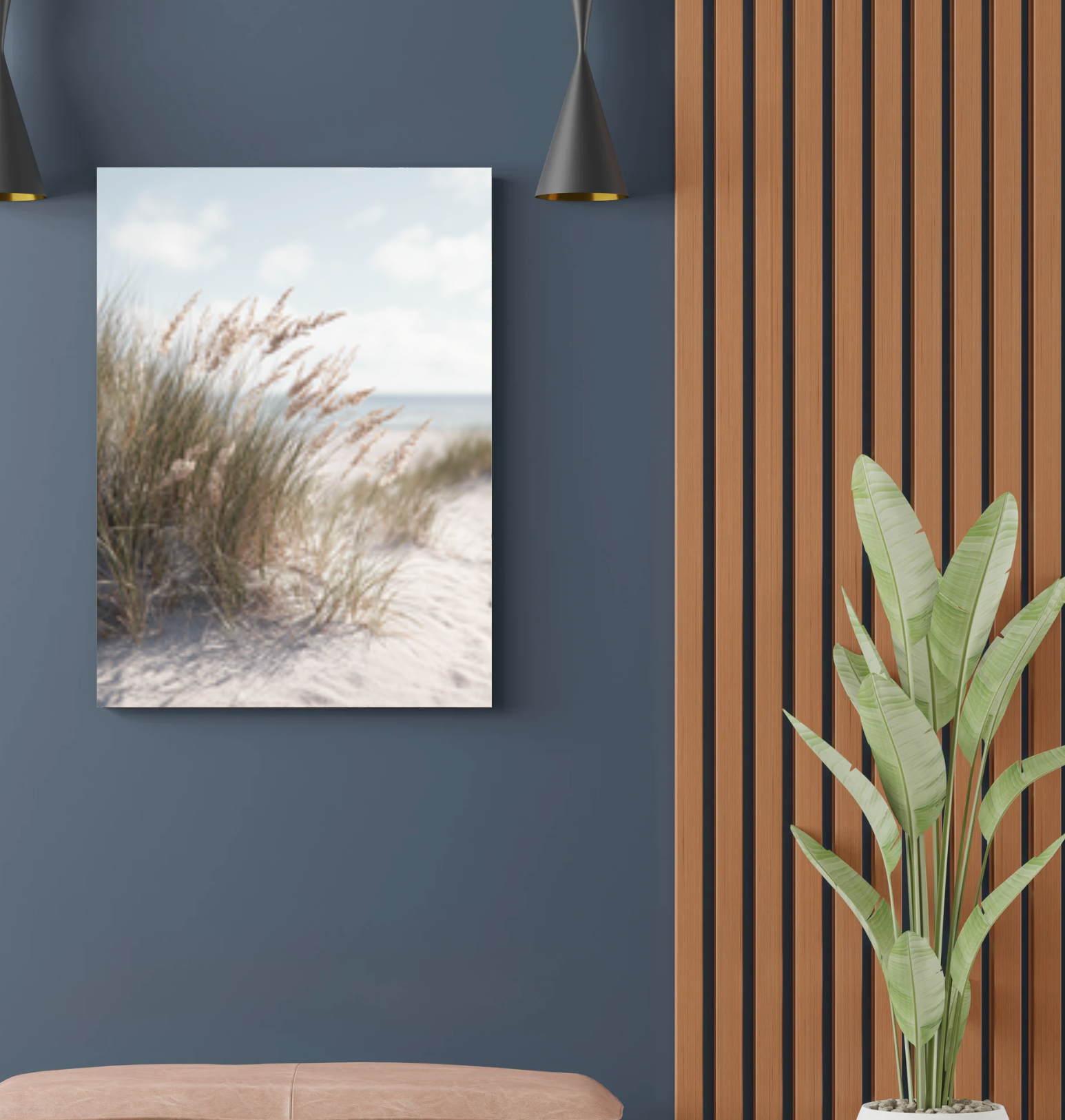 Sandposter från Nordanio med naturnära konstnärlig design och jordnära färger på en vägg.